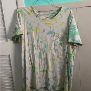 A blue,yellow,and purple top